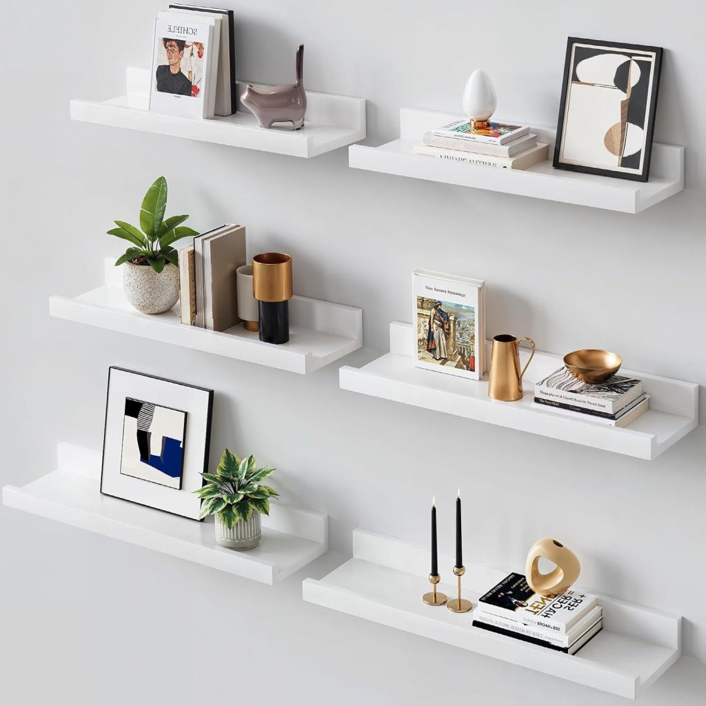 floating wooden shelves with books, plants, and decor